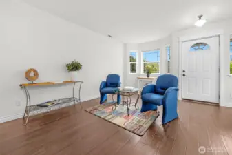 Living/great room with bay window.