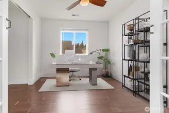 Upstairs office/TV room. (Digitally staged)