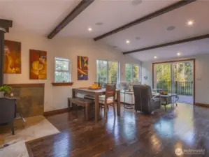 A lovely open floor plan allows for easy living with a cozy wood burning fireplace. This space also has surround sound for your favorite music