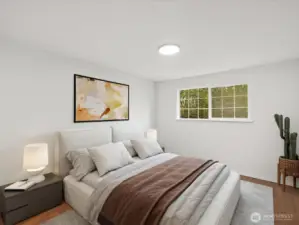 Virtually staged primary bedroom.