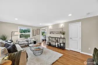 Spacious living room with beautiful hardwood floors.