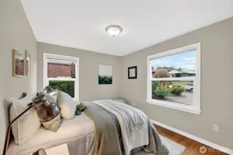 Two Bedrooms on main with large windows.