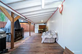 Covered porch area. with large fire pit.