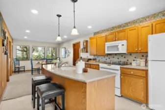 Open concept kitchen, living & small dining