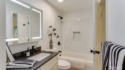 You will love your morning and evening routine in the fully remodeled full bathroom upstairs with a high tech mirror with storage.