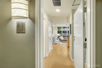 Gracious hallway lighting punctuates the zero stairs entry.