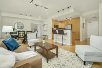 Dining room to one side (seen on the left and following photos) has plenty of space for lively meals around a large table.