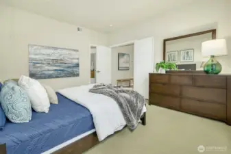 Primary bedroom with en suite bath and walk in closet
