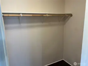 Primary walk in closet.