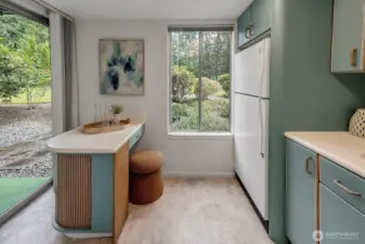 Small island in the kitchen offers seating, storage and extra counter space for food prep or display