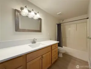 Bathroom has plenty of storage