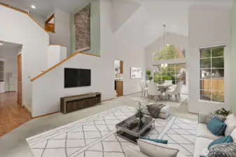 SPACIOUS LIVING ROOM W/ VAULTED CEILING AND OPEN LAYOUT. PERFECT FOR GREETING GUESTS.