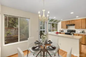 CASUAL DINING AREA W/ EASY ACCESS TO THE KITCHEN.