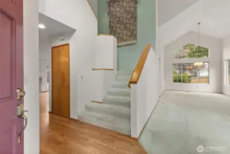ELEGANT & WIDE STAIRCASE AT ENTRY - LEADS TO BEDROOMS.