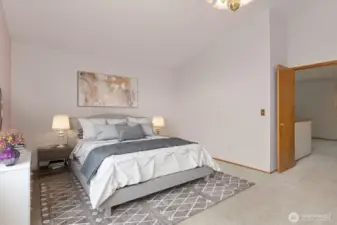 SPACIOUS PRIMARY BEDRM, W/ PRIVATE DOUBLE DOOR ACCESS AND A WELL DESIGNED BATHRM SUITE.