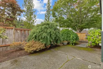 IDEAL BACKYARD WITH PRIVACY LANDSCAPING. FULLY FENCED.
