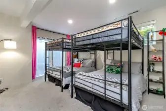 This ground level rec room is perfect for having an in home office as the door access from the outside makes it easy for guests/customers to get to.