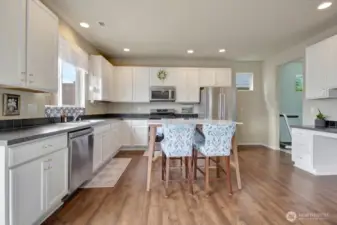 Plenty of space for a table or an island in the kitchen.