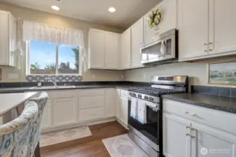 Stainless steel appliances including a gorgeous nearly new gas range.