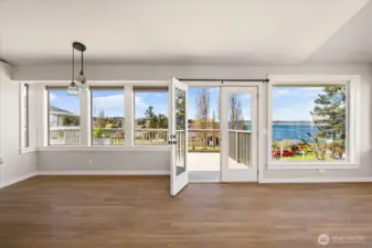 Open the french doors and expand your living space onto the deck. Wonderful views and sunny exposure.