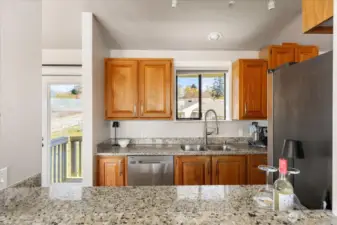 Enjoy cooking and still being a part of the conversation, with this pass-through bar