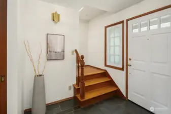 Lovely wooden staircase leads to the upper level of the home featuring 4 bedrooms and 2 bathrooms offering ample space for family, guests or home office.