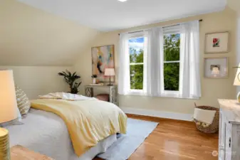 Sunny bedroom on second level, light and bright and cheerful!