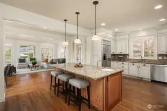 Gourmet kitchen features generous slab granite countertops, perfect for the culinary enthusiast.