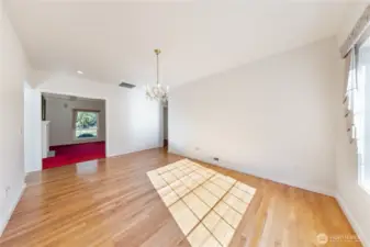 Formal dining opens to the living room