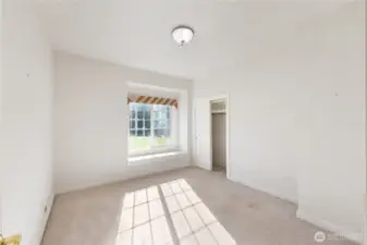 This is the other guest bedroom, also with a window seat
