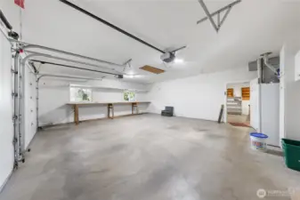 Extra deep finished 2 car garage. Pull-down ladder to attic storage