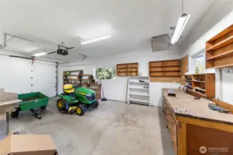 This is the 3rd car garage, accessed on the side of home.  Desirable heated shop w/ work bench!