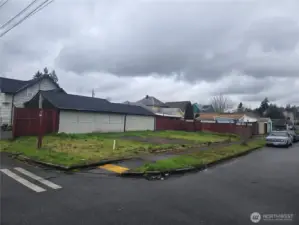 Level lot near transit is 68'x25' (1,718 sq ft) with all utilities in the street.