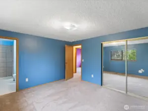 Primary w/ ensuite 3/4 bath.