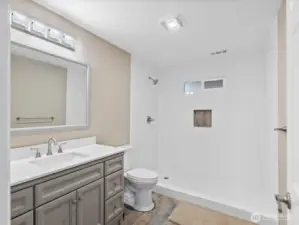 Refurbished 3/4 bath on ground level next to fam rm.