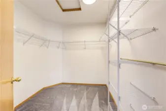 Primary walk-in closet. There is also a wall closet.