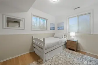 Each of the three bedrooms provides a peaceful retreat, complete with ample closet space and serene views, perfect for unwinding after a day of recreation