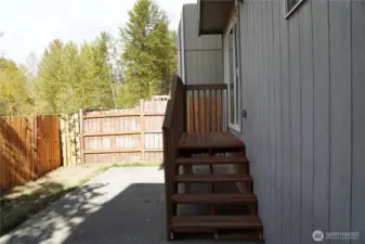 Cozy backyard with lots of potential.
