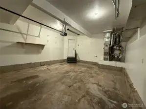 Large garage with plenty of storage space.