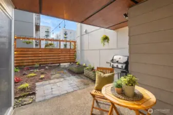 A yard like no other! This condo lives large with gardening and pet space!