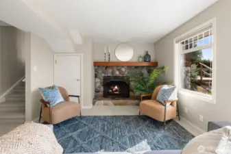 Lower level with wood burning fireplace.