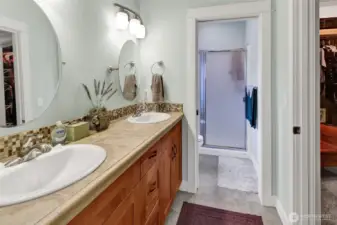 Primary bathroom with double vanity and functional layout