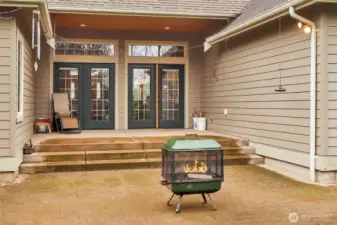 Amazing partially covered patio space, gives enough cover to grill while still letting in natural light.
