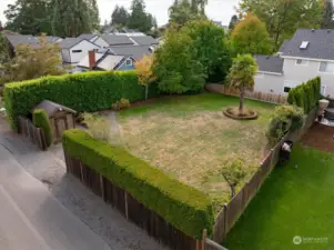 Flat and fully fenced 5000 square foot lot in Crown Hill