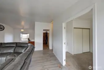 From the main entrance looking into the dining room, bathroom #2 and bedroom #3