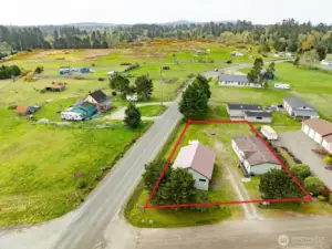 Mixed-Use Zoned 3-bedroom home and shop with a fully fenced .31 acre yard has a 1200 square foot 4 bay shop with a 100 amp service for all your toys or projects, plus an RV hookup