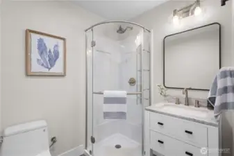 Three-quarter bath services the 4th bedroom on the lower level.