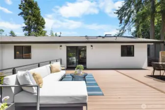 Huge Trex patio off the kitchen and main living space extends the living space outside.