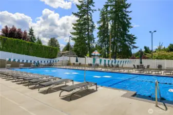 Members enjoy a four lane 25 - yard pool that sits adjacent to the clubhouse. The pool provides lap swimmers their own lane, while the balance of the pool is open for swimmers of all levels. In addition to the full - size pool, a baby pool is available for parents and tots that is heated to a comfortable 80 degrees.