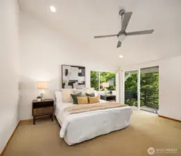 Primary Bedroom w Vaulted Celings & Deck